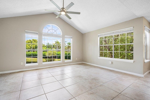 1000 Crystal Way Unit J, Delray Beach, FL 33444 - unfurnished room with plenty of natural light, ceiling fan, tile patterned flooring, a textured ceiling, and lofted ceiling
