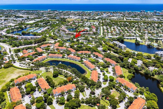 1000 Crystal Way Unit J, Delray Beach, FL 33444 - aerial overview of property's location with a nearby body of water and nearby suburban area
