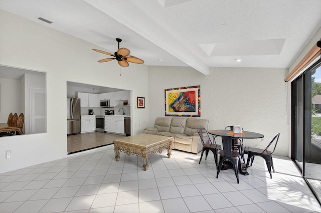 3010 NW 12th St Unit D, Delray Beach, FL 33445 - living area with a skylight and a ceiling fan