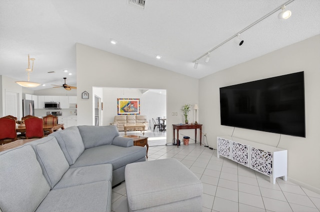 3010 NW 12th St Unit D, Delray Beach, FL 33445 - living room with a ceiling fan, lofted ceiling, light tile patterned floors, and recessed lighting