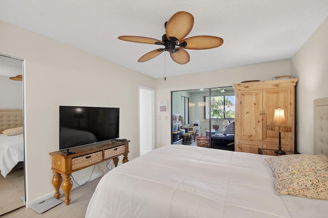 3010 NW 12th St Unit D, Delray Beach, FL 33445 - bedroom with light tile patterned flooring, a ceiling fan, and access to exterior