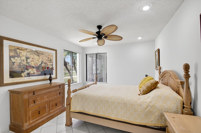 3010 NW 12th St Unit D, Delray Beach, FL 33445 - bedroom featuring a textured ceiling, light tile patterned flooring, a ceiling fan, and recessed lighting