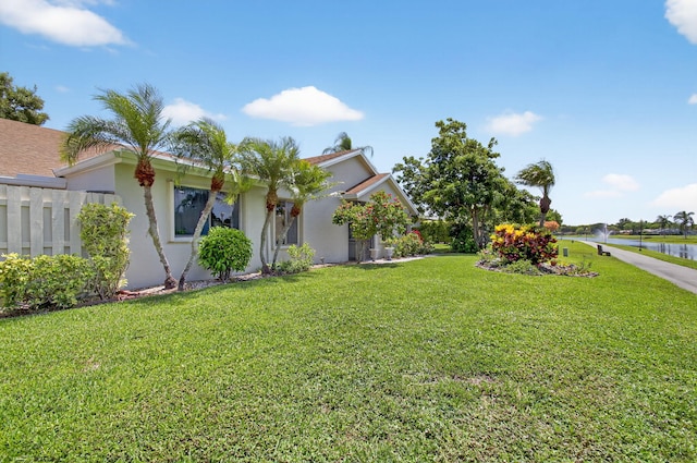 3010 NW 12th St Unit D, Delray Beach, FL 33445 - view of front of house with stucco siding and a water view