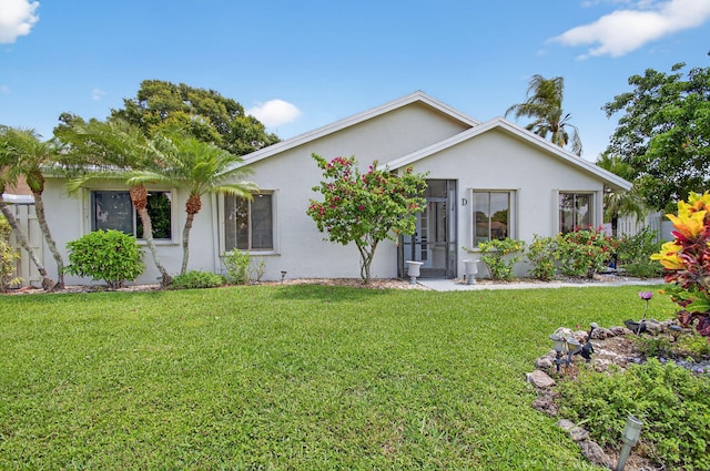 3010 NW 12th St Unit D, Delray Beach, FL 33445 - single story home featuring stucco siding and a front yard
