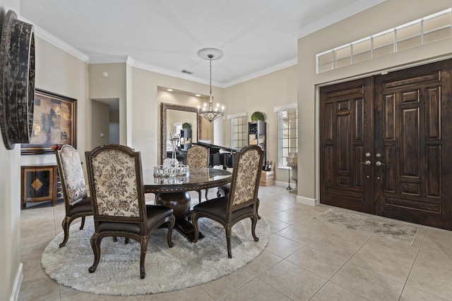 801 SW Classico Ct, Port Saint Lucie, FL 34986 - dining area with a chandelier, ornamental molding, and light tile patterned flooring