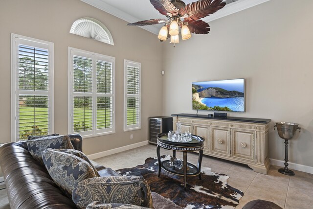 801 SW Classico Ct, Port Saint Lucie, FL 34986 - living room with crown molding, plenty of natural light, ceiling fan, light tile patterned flooring, and beverage cooler
