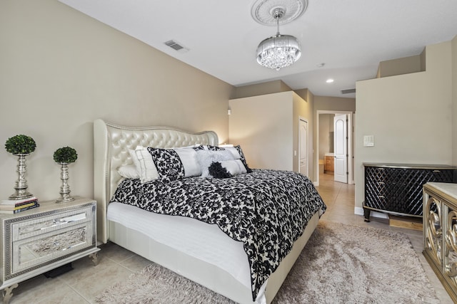 801 SW Classico Ct, Port Saint Lucie, FL 34986 - bedroom featuring light tile patterned flooring and a chandelier