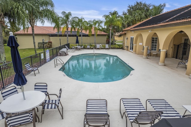 801 SW Classico Ct, Port Saint Lucie, FL 34986 - community pool featuring a patio
