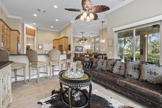 801 SW Classico Ct, Port Saint Lucie, FL 34986 - living room featuring a ceiling fan, light tile patterned flooring, a chandelier, healthy amount of natural light, and crown molding