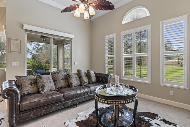 801 SW Classico Ct, Port Saint Lucie, FL 34986 - living room with a ceiling fan, light tile patterned floors, and ornamental molding