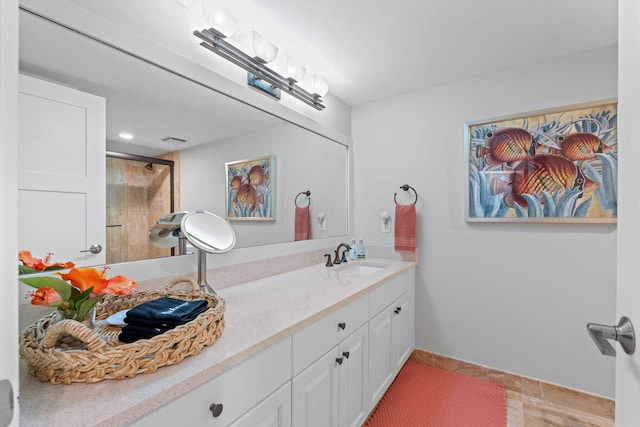 5280 N Ocean Dr Unit 3B, Singer Island, FL 33404 - bathroom with double vanity and a shower with door