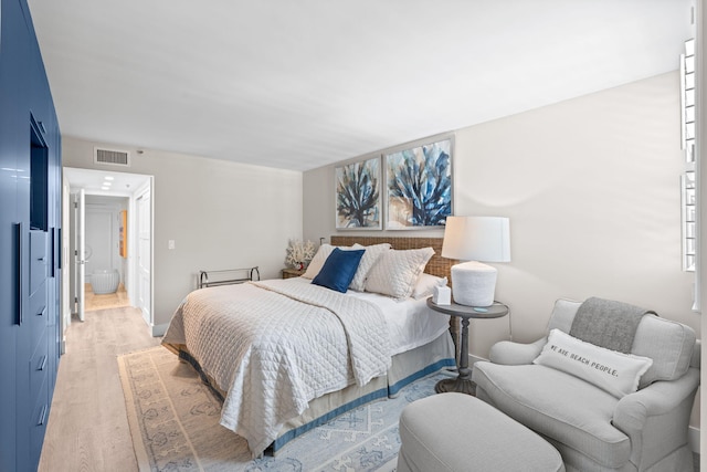 5280 N Ocean Dr Unit 3B, Singer Island, FL 33404 - bedroom featuring light wood-type flooring and baseboards