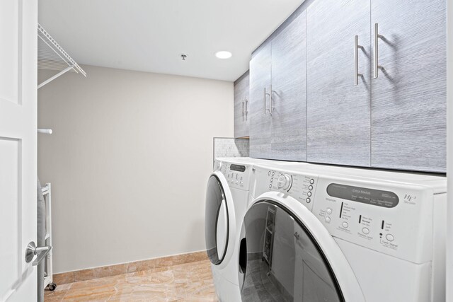 5280 N Ocean Dr Unit 3B, Singer Island, FL 33404 - laundry room featuring washer and dryer and baseboards
