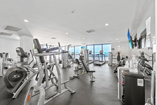 5280 N Ocean Dr Unit 3B, Singer Island, FL 33404 - workout area with expansive windows and recessed lighting