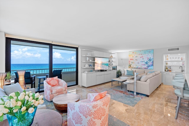 5280 N Ocean Dr Unit 3B, Singer Island, FL 33404 - living area with built in features and bar