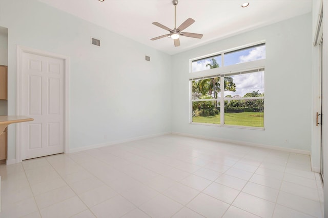 6025 Fountain Palm Dr, Jupiter, FL 33458 - spare room featuring a ceiling fan and baseboards
