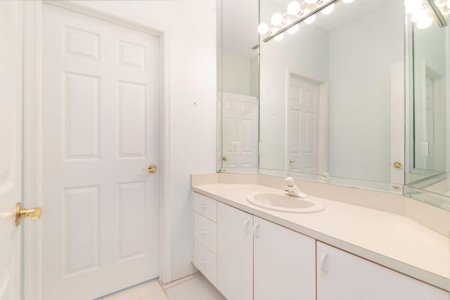 6025 Fountain Palm Dr, Jupiter, FL 33458 - bathroom with vanity and tile patterned flooring