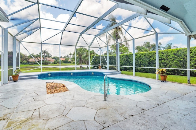 6025 Fountain Palm Dr, Jupiter, FL 33458 - swimming pool featuring a patio area and glass enclosure