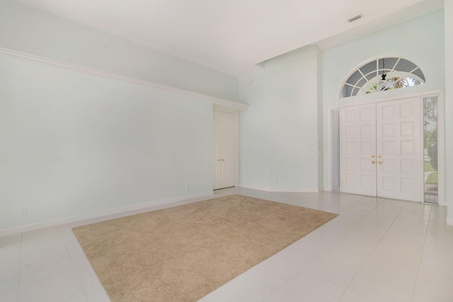 6025 Fountain Palm Dr, Jupiter, FL 33458 - foyer entrance with a towering ceiling and baseboards