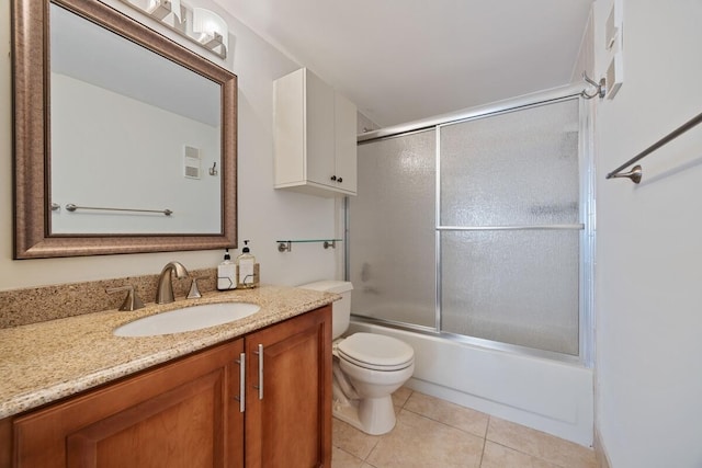15378 Lakes Of Delray Blvd Unit 15, Delray Beach, FL 33484 - bathroom featuring vanity, tile patterned flooring, and bath / shower combo with glass door
