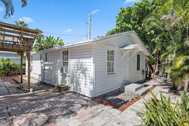4621 N Ocean Blvd, Boynton Beach, FL 33435 - view of property exterior with a patio