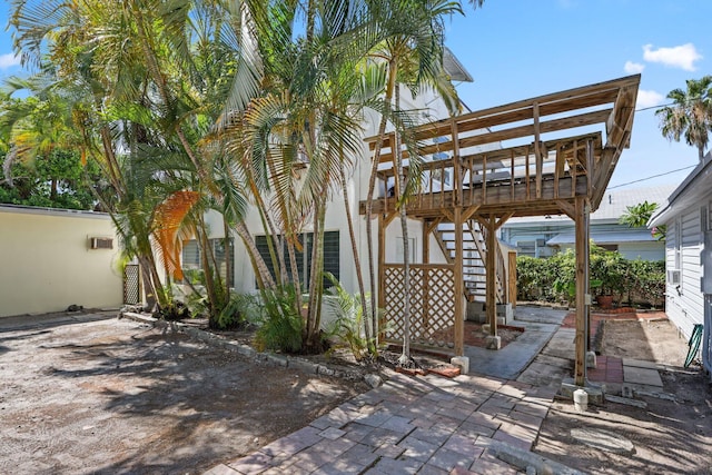 4621 N Ocean Blvd, Boynton Beach, FL 33435 - view of patio / terrace featuring stairway and a deck