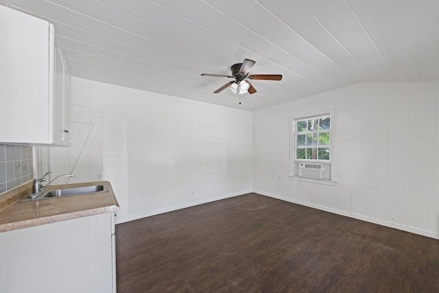 4621 N Ocean Blvd, Boynton Beach, FL 33435 - empty room featuring dark wood-style floors, a ceiling fan, and cooling unit