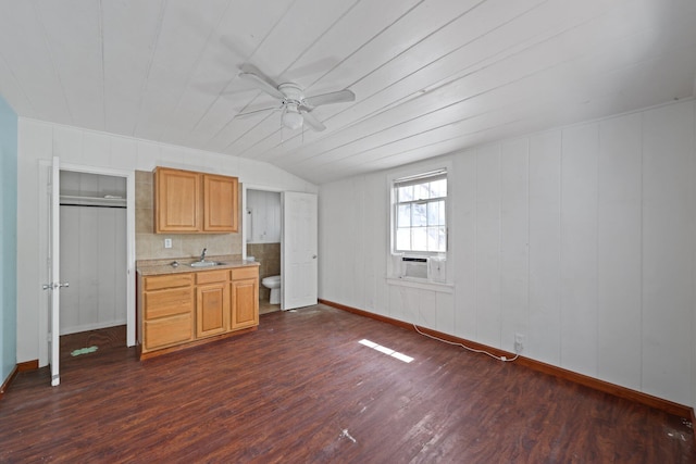 4621 N Ocean Blvd, Boynton Beach, FL 33435 - kitchen with dark wood finished floors, light countertops, a ceiling fan, lofted ceiling, and cooling unit