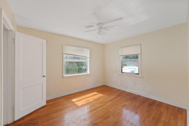 4621 N Ocean Blvd, Boynton Beach, FL 33435 - unfurnished room with hardwood / wood-style floors and a ceiling fan