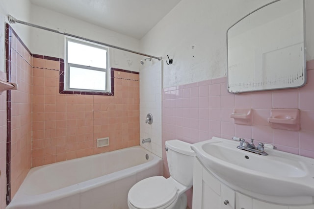 4621 N Ocean Blvd, Boynton Beach, FL 33435 - full bath featuring bathtub / shower combination, tile walls, and vanity