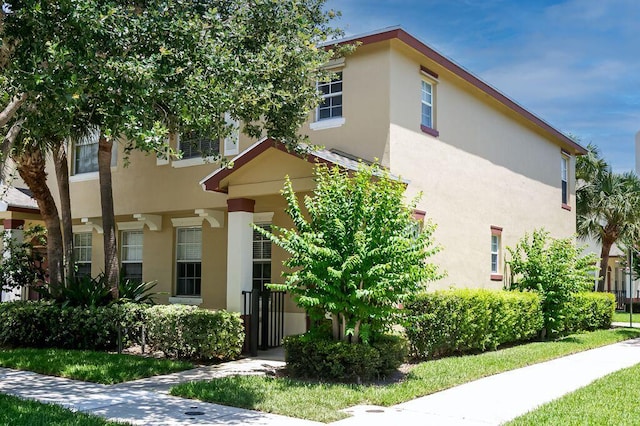 2113 SE Fern Park Dr, Port Saint Lucie, FL 34952 - townhome / multi-family property featuring stucco siding