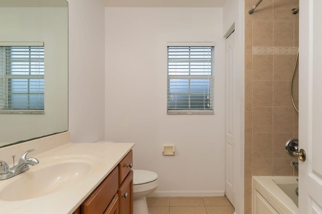 2113 SE Fern Park Dr, Port Saint Lucie, FL 34952 - full bathroom featuring plenty of natural light, vanity, tile patterned flooring, and  shower combination