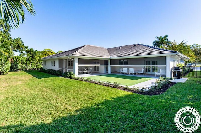 4941 S Lake Dr, Boynton Beach, FL 33436 - back of house with french doors, a patio, a tiled roof, and stucco siding