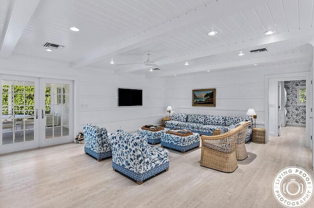 4941 S Lake Dr, Boynton Beach, FL 33436 - living area with french doors, wood finished floors, recessed lighting, ceiling fan, and a decorative wall