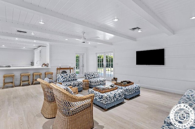 4941 S Lake Dr, Boynton Beach, FL 33436 - living area featuring wood finished floors, ceiling fan, beamed ceiling, recessed lighting, and a decorative wall