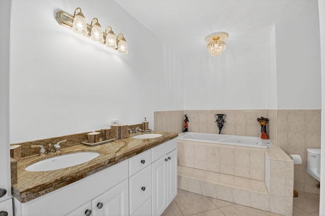 1111 Lemon Tree Ter Unit 204, Delray Beach, FL 33445 - bathroom featuring a garden tub, tile patterned flooring, and double vanity