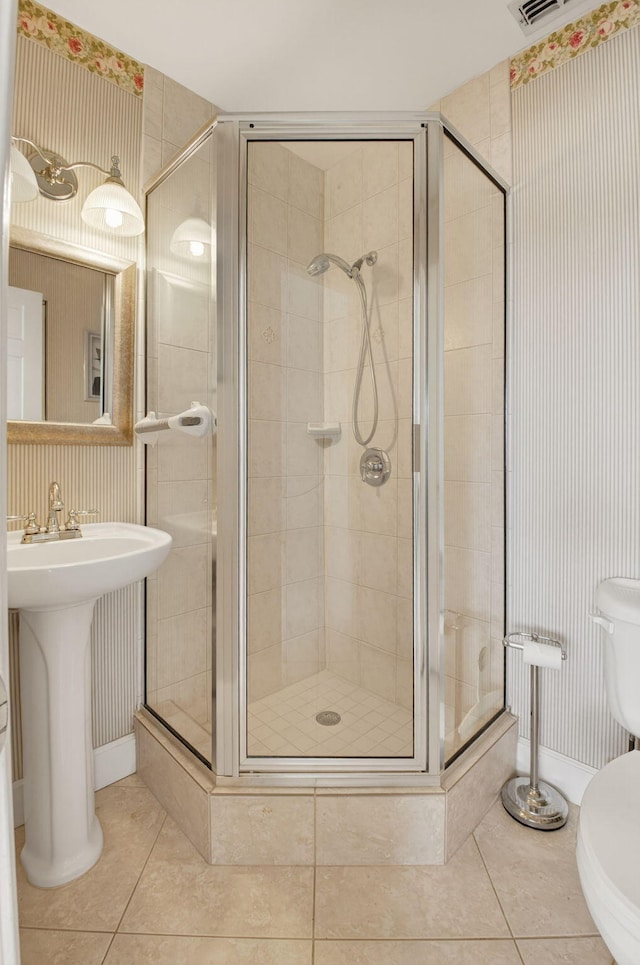 1111 Lemon Tree Ter Unit 204, Delray Beach, FL 33445 - full bath featuring a shower stall, wallpapered walls, and tile patterned flooring