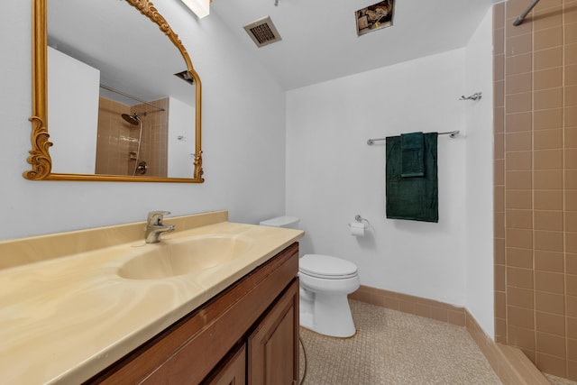 14623 Bonaire Blvd Unit 203, Delray Beach, FL 33446 - bathroom featuring vanity, tiled shower, and tile patterned flooring