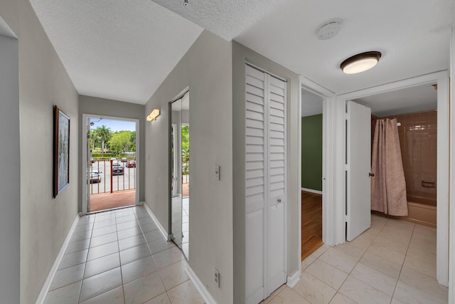 14623 Bonaire Blvd Unit 203, Delray Beach, FL 33446 - corridor with a textured ceiling