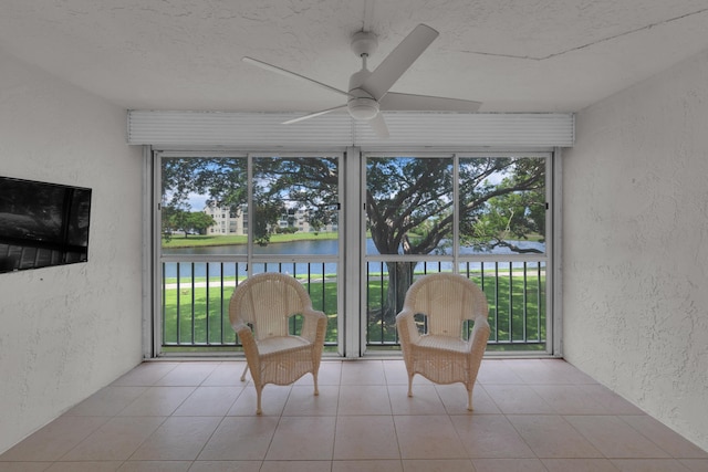 14623 Bonaire Blvd Unit 203, Delray Beach, FL 33446 - sunroom / solarium featuring a water view, ceiling fan, and healthy amount of natural light