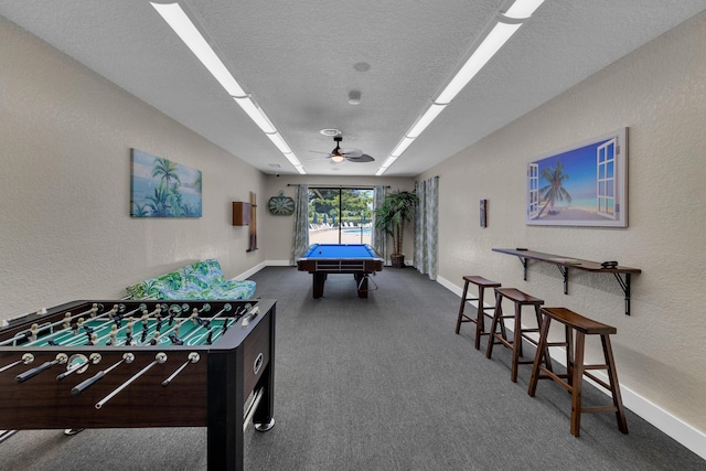 14623 Bonaire Blvd Unit 203, Delray Beach, FL 33446 - playroom with carpet flooring, billiards table, a textured wall, ceiling fan, and a textured ceiling