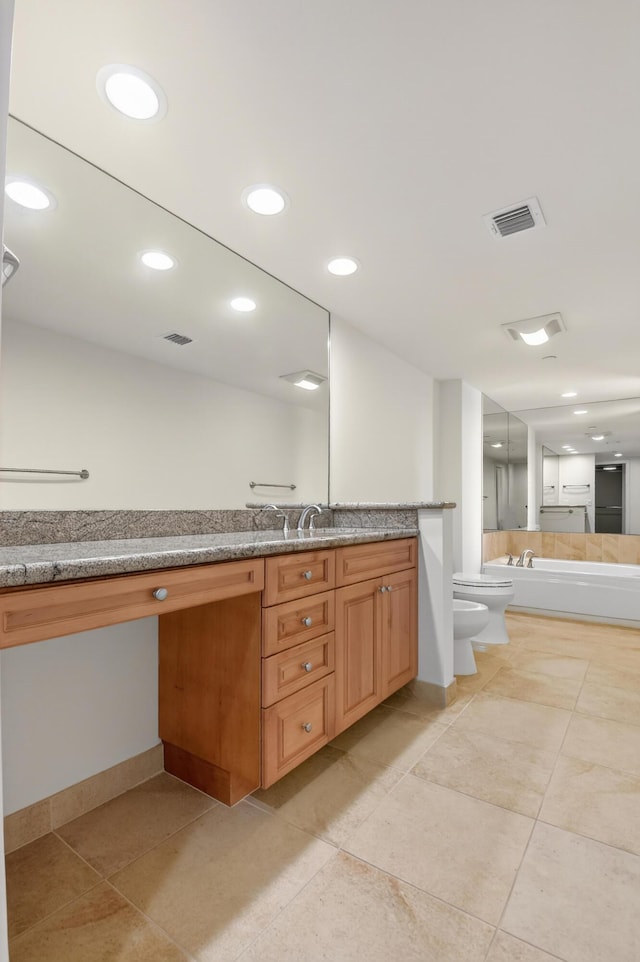 4000 N Ocean Dr Unit 204, Singer Island, FL 33404 - full bath featuring a bidet, vanity, a bath, tile patterned floors, and recessed lighting
