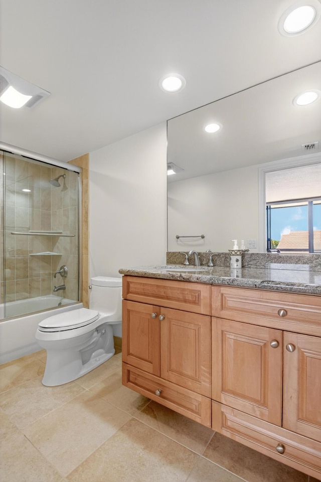 4000 N Ocean Dr Unit 204, Singer Island, FL 33404 - bathroom with vanity, bath / shower combo with glass door, tile patterned floors, and recessed lighting