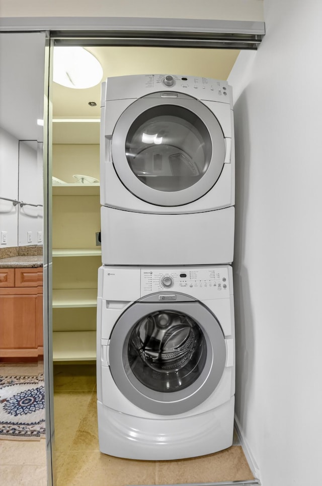 4000 N Ocean Dr Unit 204, Singer Island, FL 33404 - laundry area with estacked washer and dryer