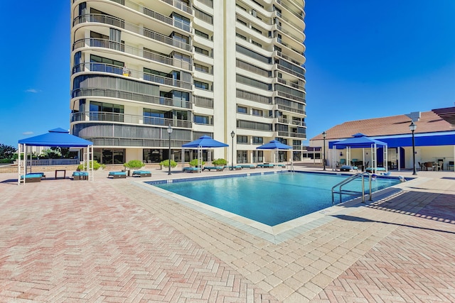 4000 N Ocean Dr Unit 204, Singer Island, FL 33404 - community pool with a gazebo and a patio