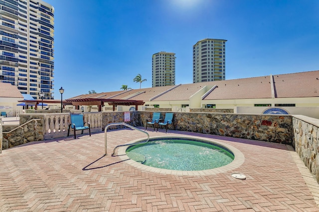 4000 N Ocean Dr Unit 204, Singer Island, FL 33404 - view of swimming pool with a patio