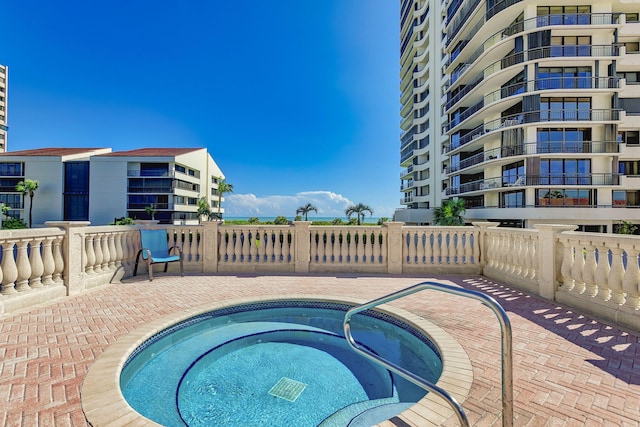 4000 N Ocean Dr Unit 204, Singer Island, FL 33404 - view of swimming pool featuring a hot tub