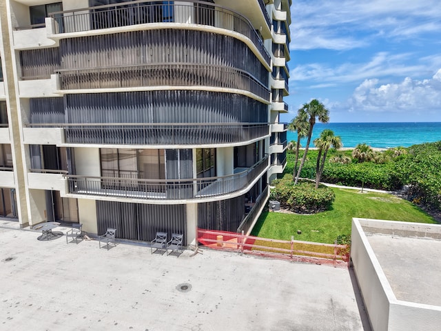 4000 N Ocean Dr Unit 204, Singer Island, FL 33404 - view of building exterior with a water view