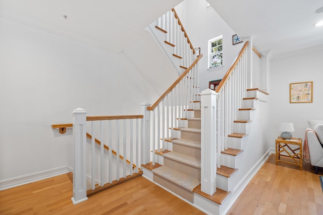 326 Tuxedo Ln, West Palm Beach, FL 33401 - stairs featuring wood finished floors and crown molding