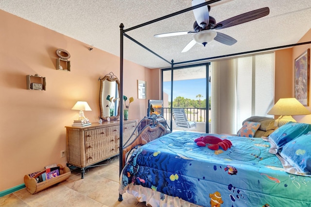 2400 S Ocean Dr Unit 4223, Fort Pierce, FL 34949 - tiled bedroom featuring access to outside, a textured ceiling, and ceiling fan
